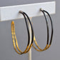 Metamorphosis Metals/Sonya Coulson Rook and Jackey Rook - Large Wavey Steel & Gold Hoops