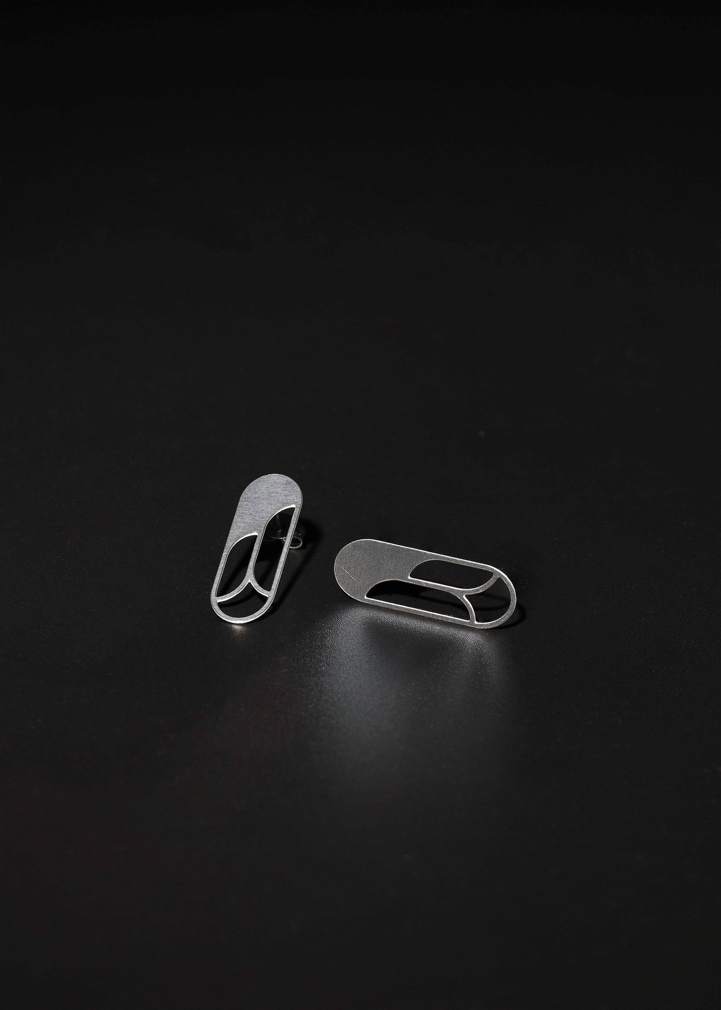 Angular Moment - Rose Studs: Stainless Steel
