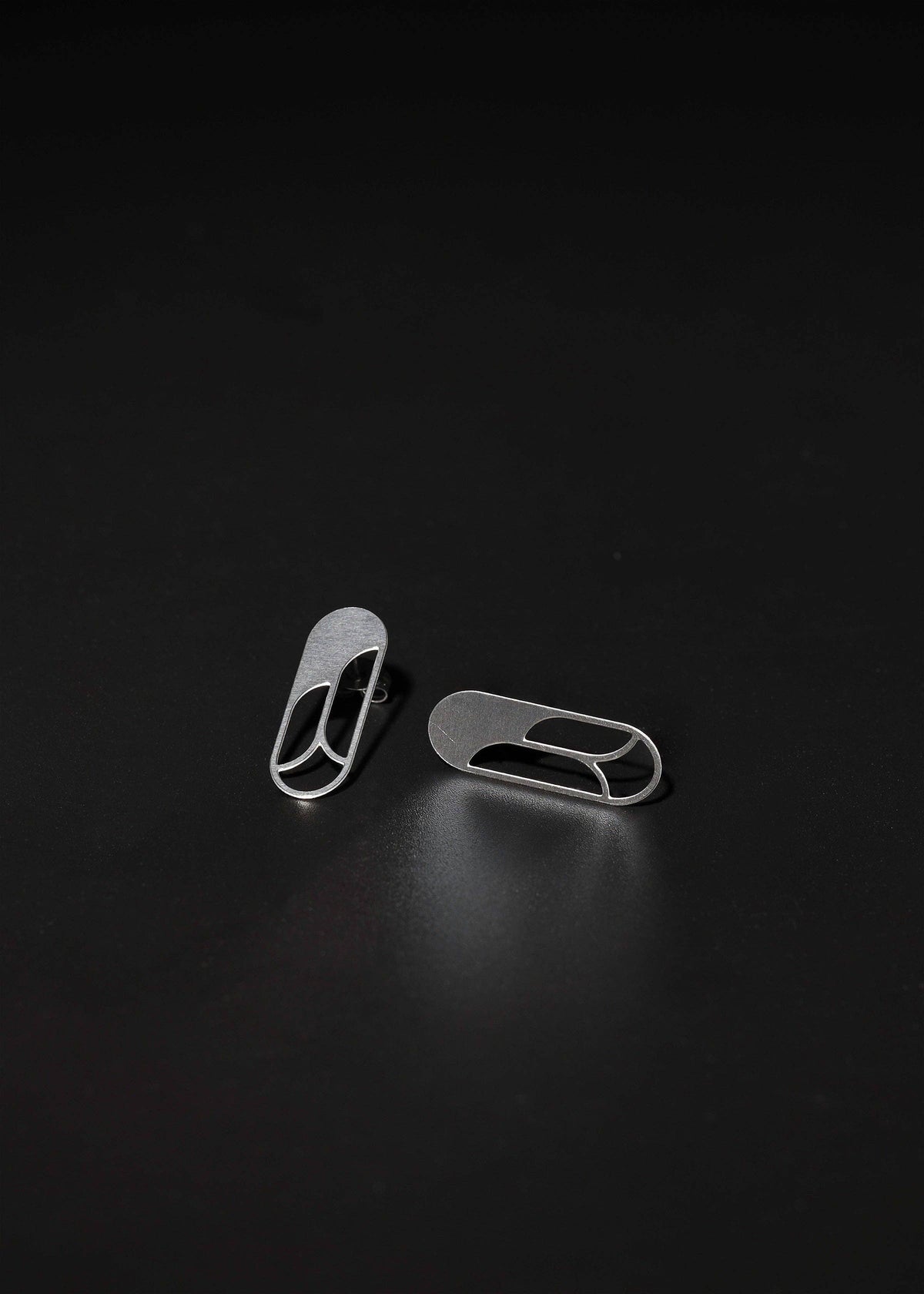 Angular Moment - Rose Studs: Stainless Steel